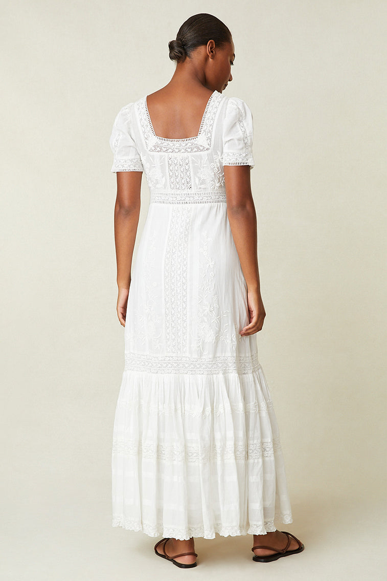 White tiered Victorian maxi dress with square back neckline and puff sleeves