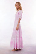 Peony pink maxi dress with lace-look sleeves and tiered skirt, side view