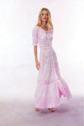 Light pink maxi dress with V-neck and button front, embroidered details and tiered hem