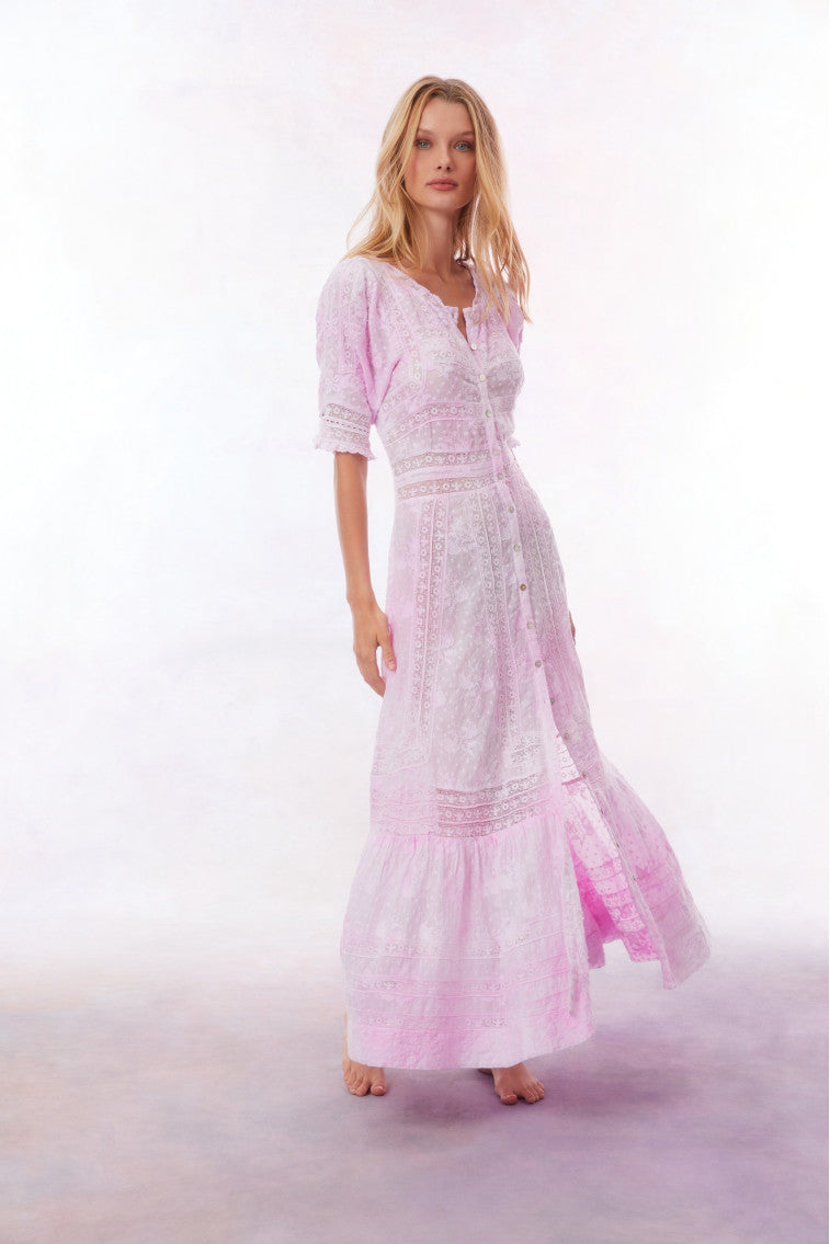 Light pink maxi dress with V-neck and button front, embroidered details and tiered hem