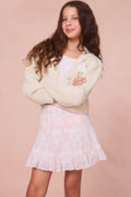 Girls cream alpaca bow button cardigan with V-neck and chest bow detail