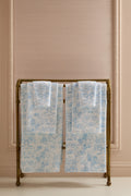 Pair of light blue cotton hand towels with all-over floral print, folded