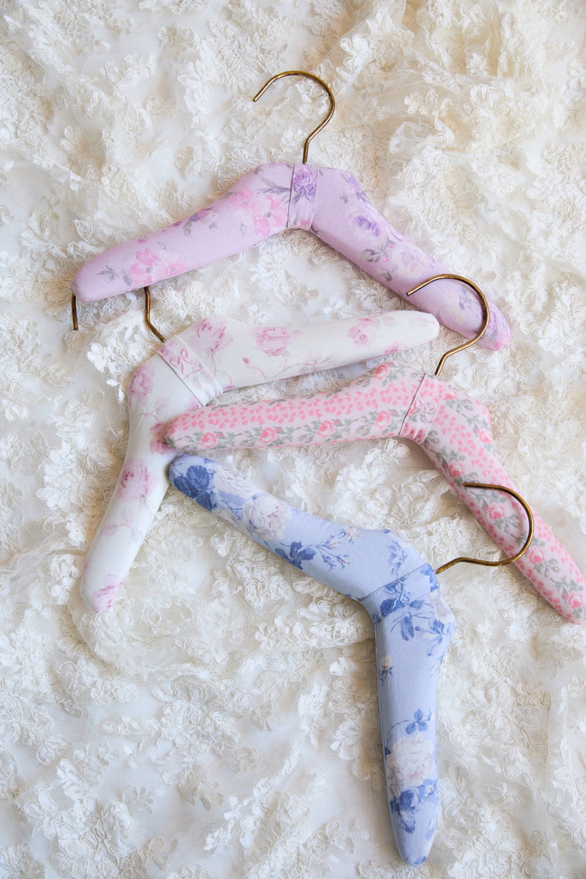 Kids fabric print hangers set of 4, pastel florals and stripes with gold hooks