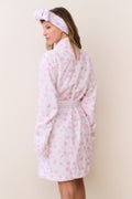 Pink floral cotton bathrobe with tie belt and shawl collar, back/side view on model