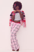 Pink plaid pajama pants with drawstring waist and flared leg cuffs