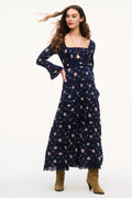 Navy floral cotton maxi dress with square neckline, long sleeves, tiered skirt