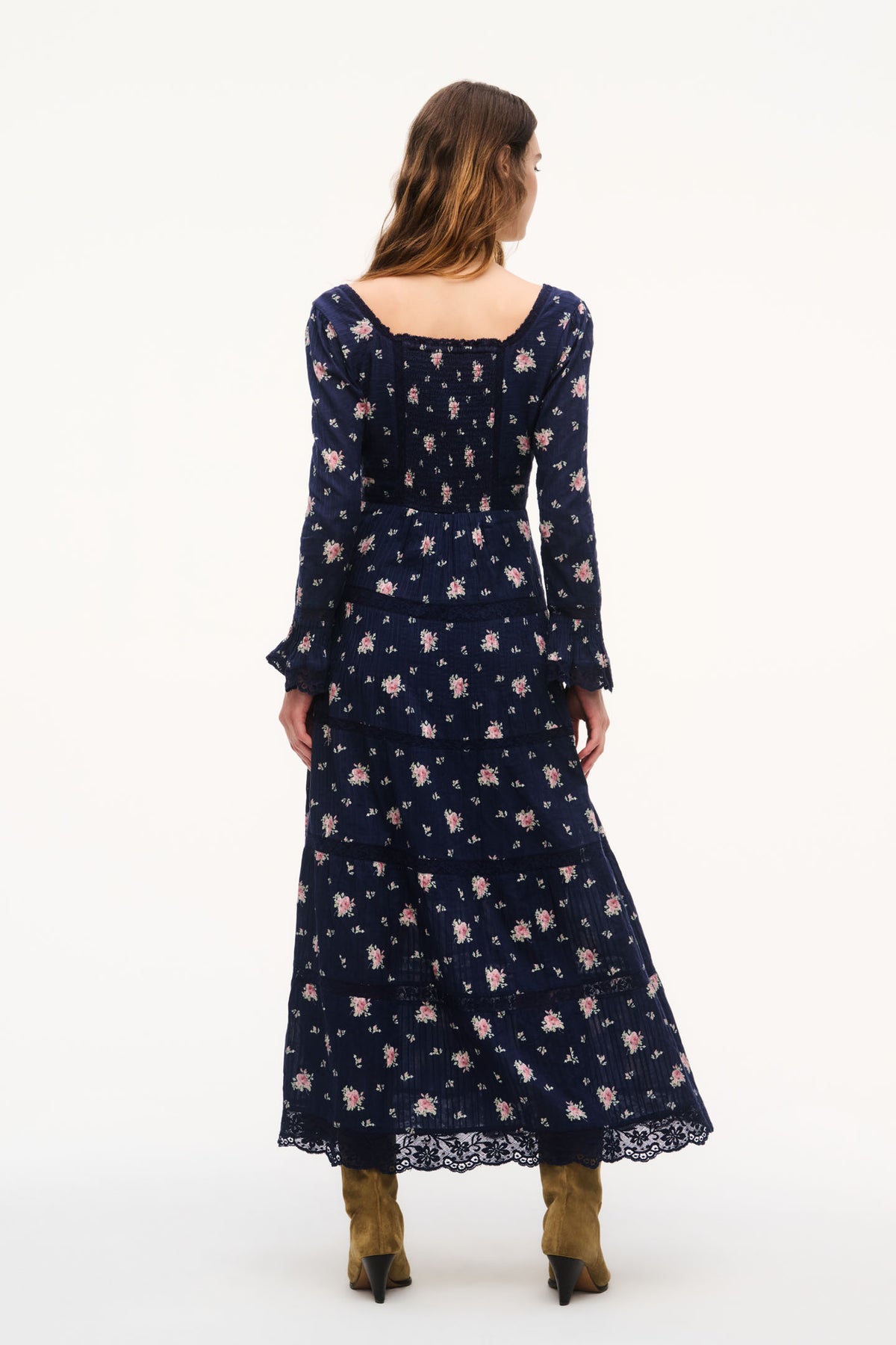 Navy floral maxi dress back view with long sleeves and tiered hem