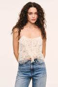 Auraveyn lace ruffle cami front view, off-white lace with ruffle hem