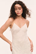 White burnout velvet maxi dress with V-neckline and thin spaghetti straps
