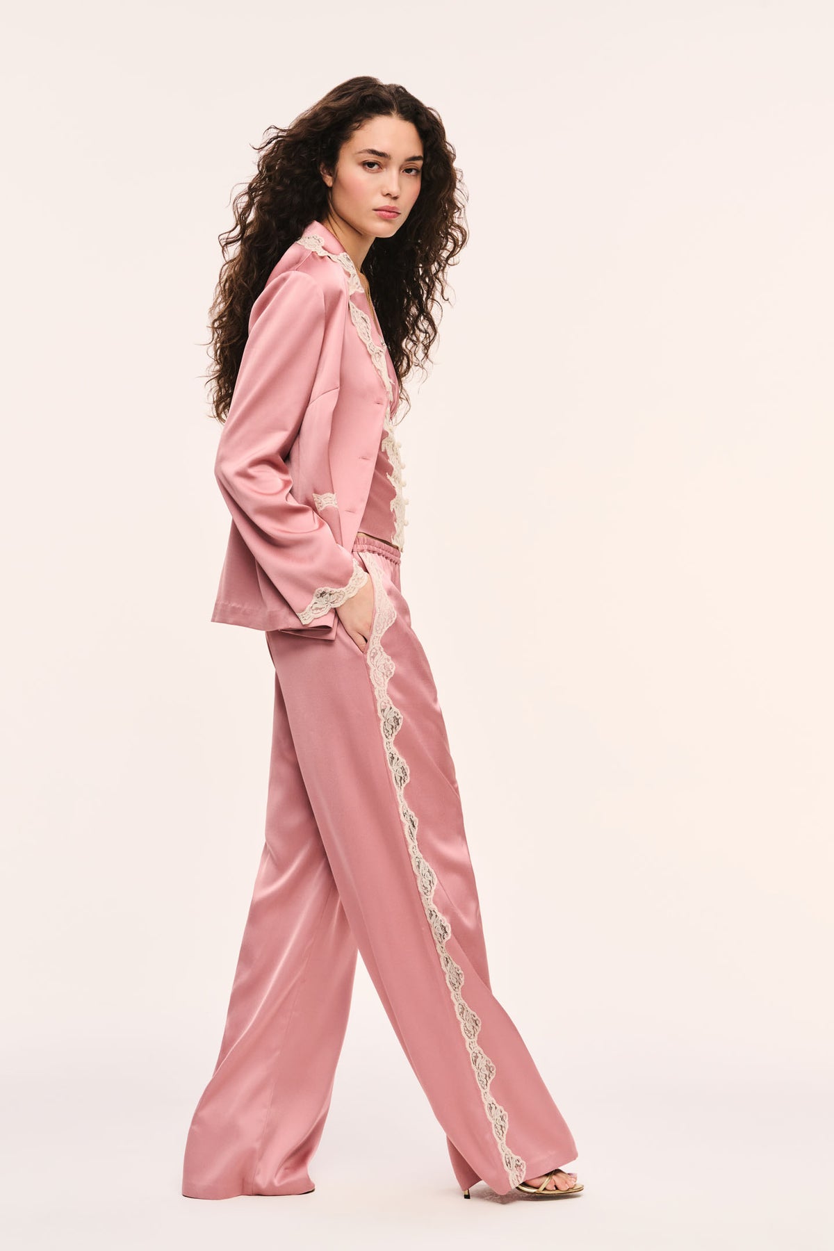 Women's crepe button-down top in flushed nude with lace-trim cuffs and side seam detailing