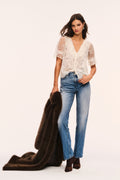 Sheer lace top in alabaster, V-neck with short sleeves and scalloped hem