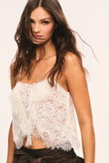 Auraveyn lace ruffle cami close-up, off-white lace bodice with fringed hem