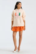 Light peach graphic hoodie with pullover hood and drawstring, long sleeves
