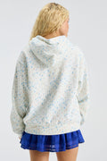 Light blue speckle hoodie with hood and drawstring, back view with layered blue hem