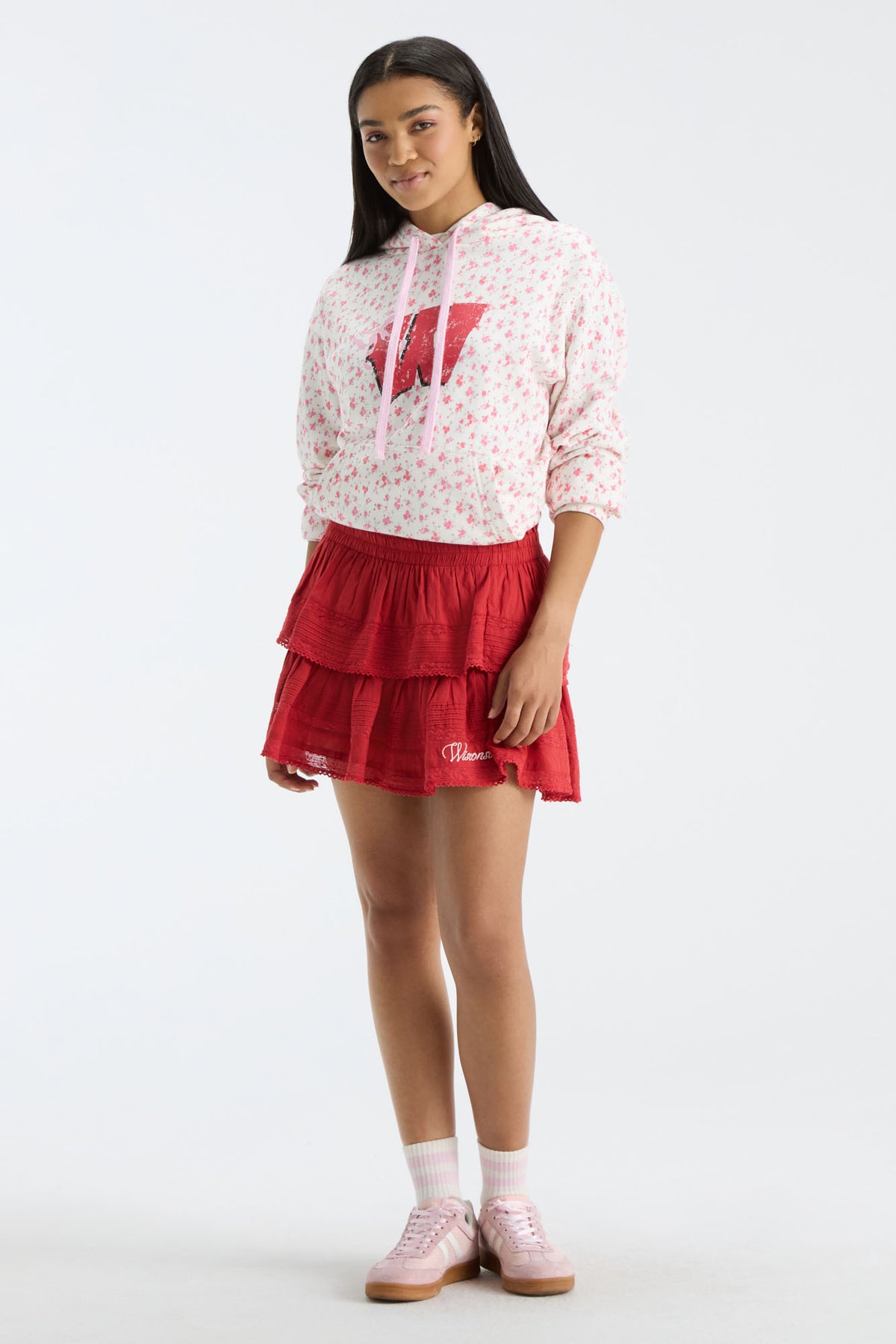 Pink patterned Nacova hoodie with drawstring hood and red W logo graphic.