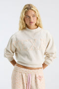 Cream mockneck sweatshirt with large "LOVE" graphic and relaxed cropped fit