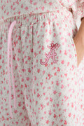 Floral sweatpants with elastic waistband and embroidered A logo on the thigh