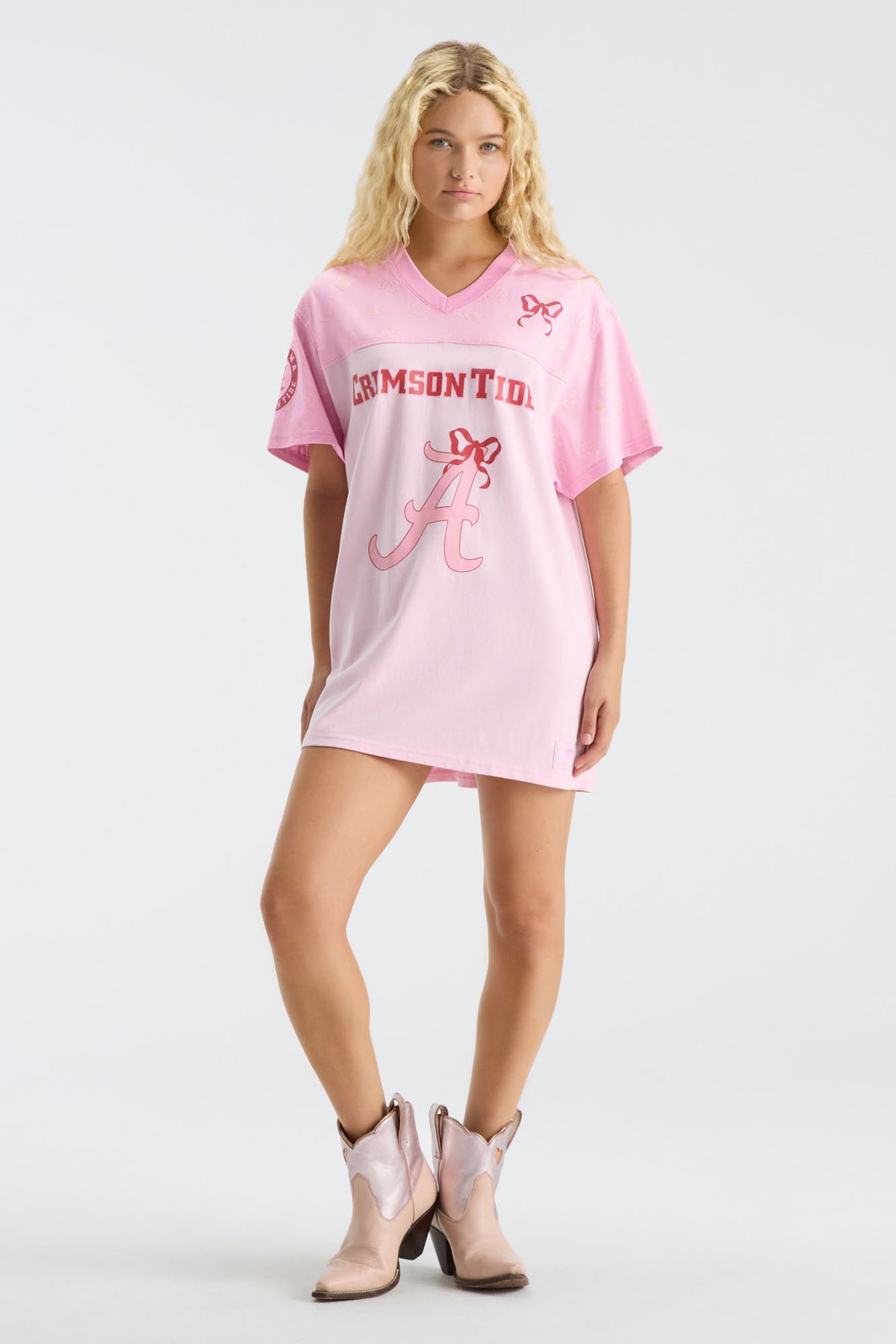 Pink V-neck jersey dress with front A-bow logo and team text graphic