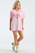 Pink V-neck jersey dress with Texas text and longhorn logo, full body view