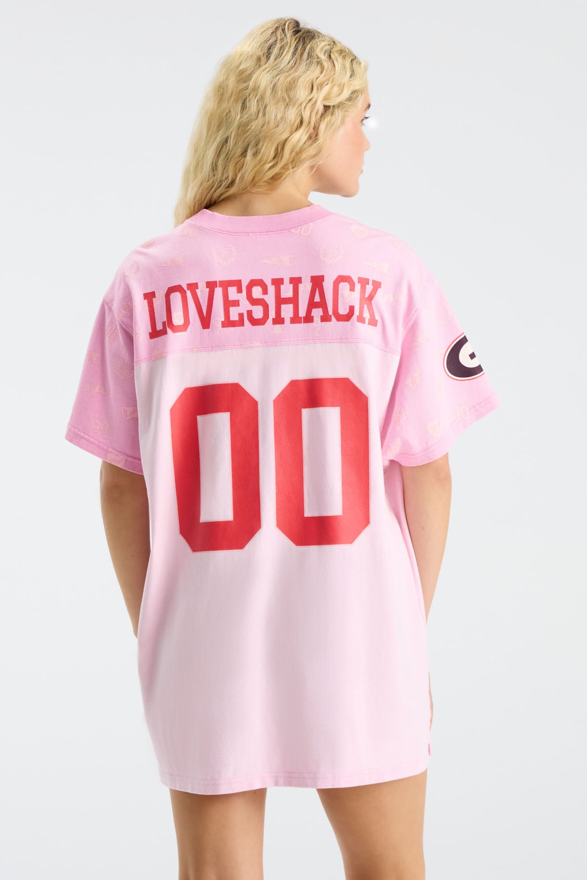 Pink varsity jersey dress back with LoveShack text and '00' print