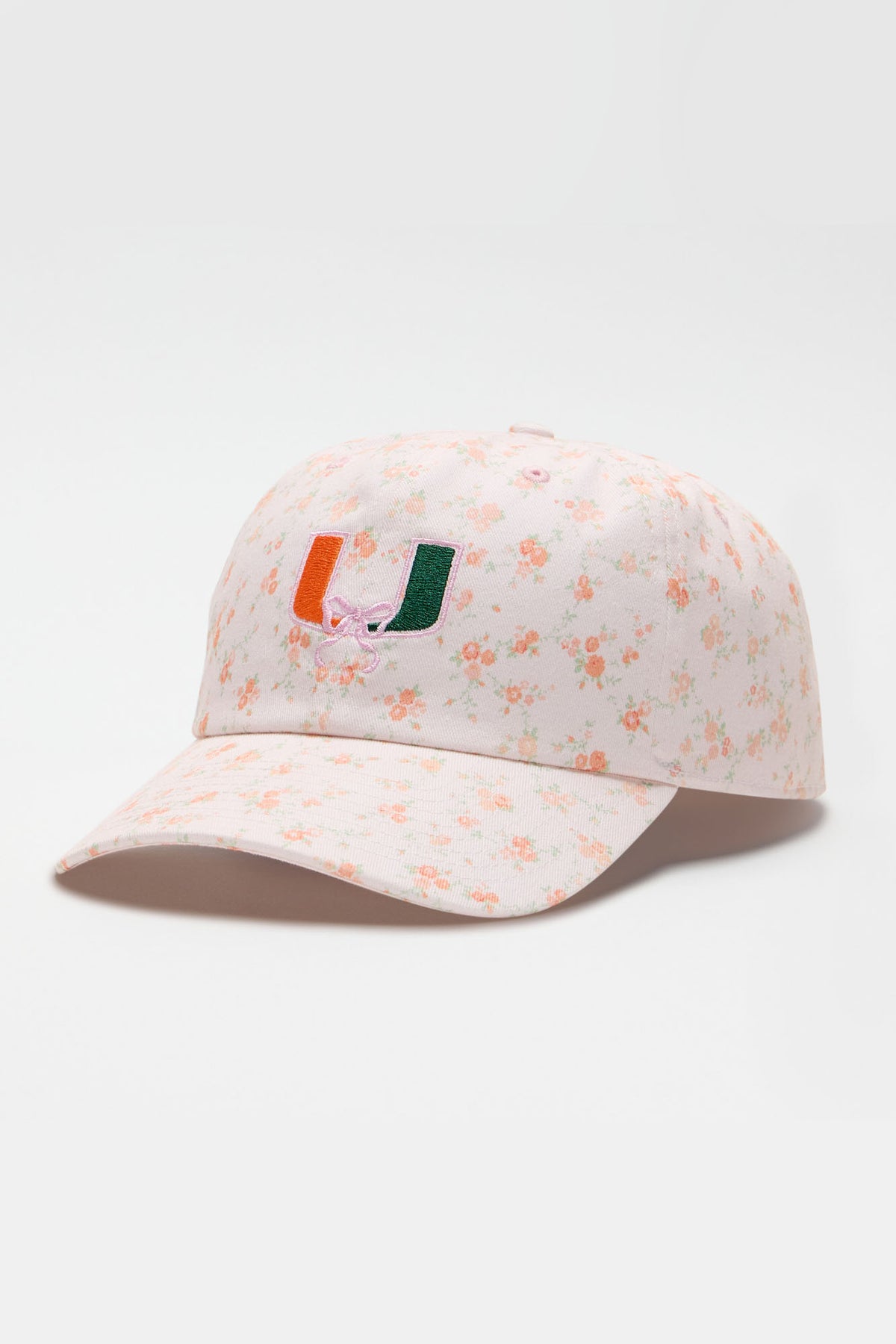 Floral baseball cap with front logo patch and curved brim in light pink and orange