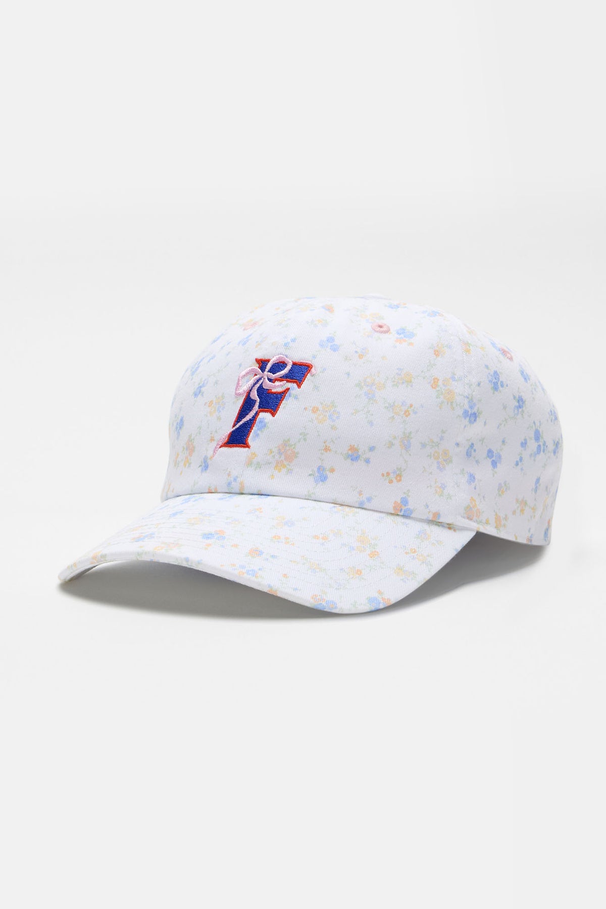 White floral baseball cap with blue-and-red team logo