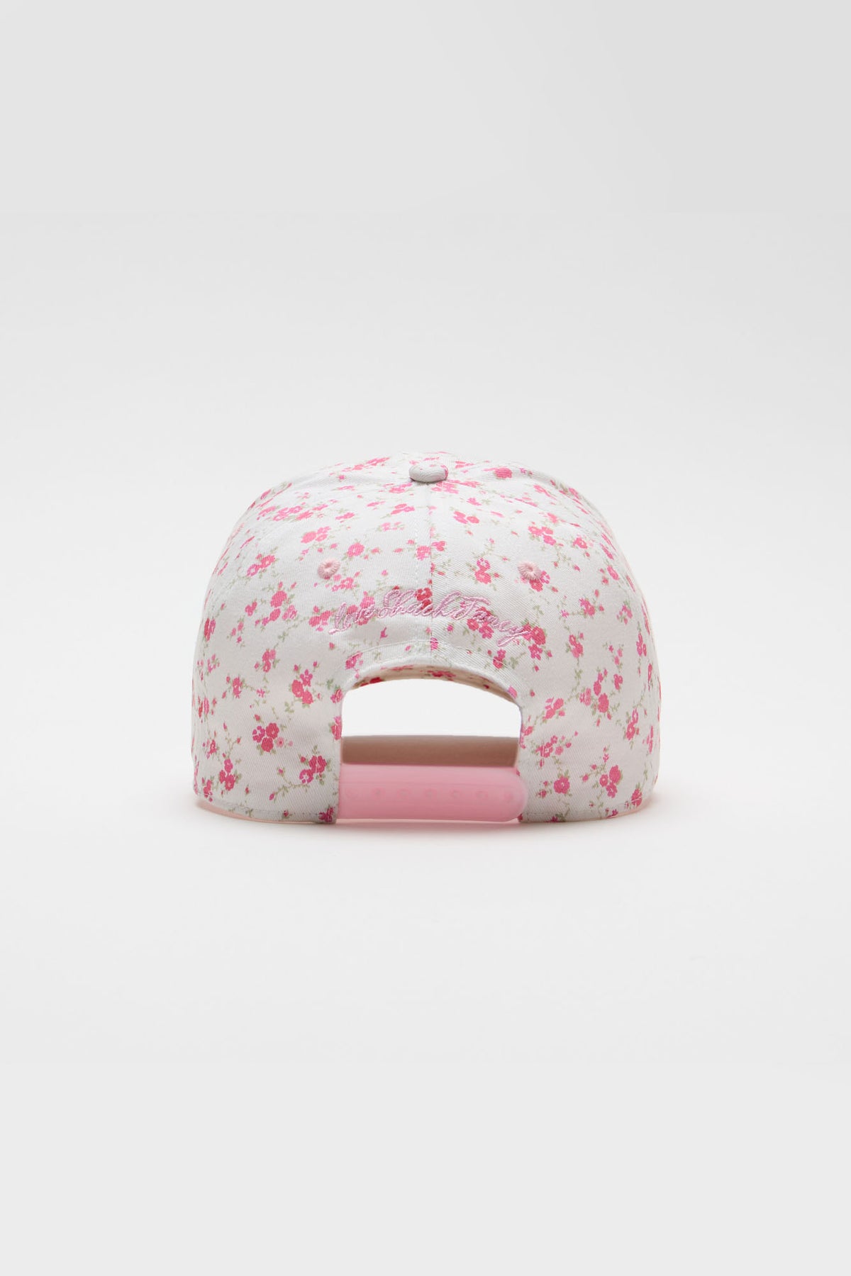Pink floral baseball cap with open mesh back panel and small scattered prints