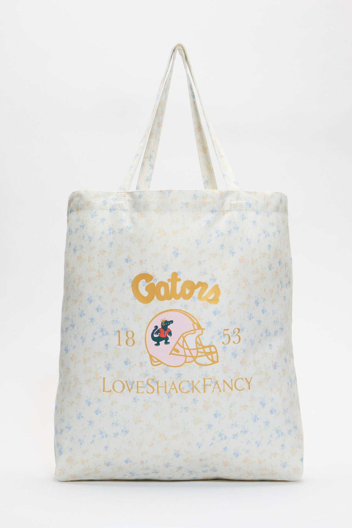 Light blue tote bag with all-over speckle pattern and printed team logo