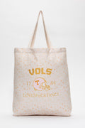 Cream tote bag with small speckle pattern and printed team logo text