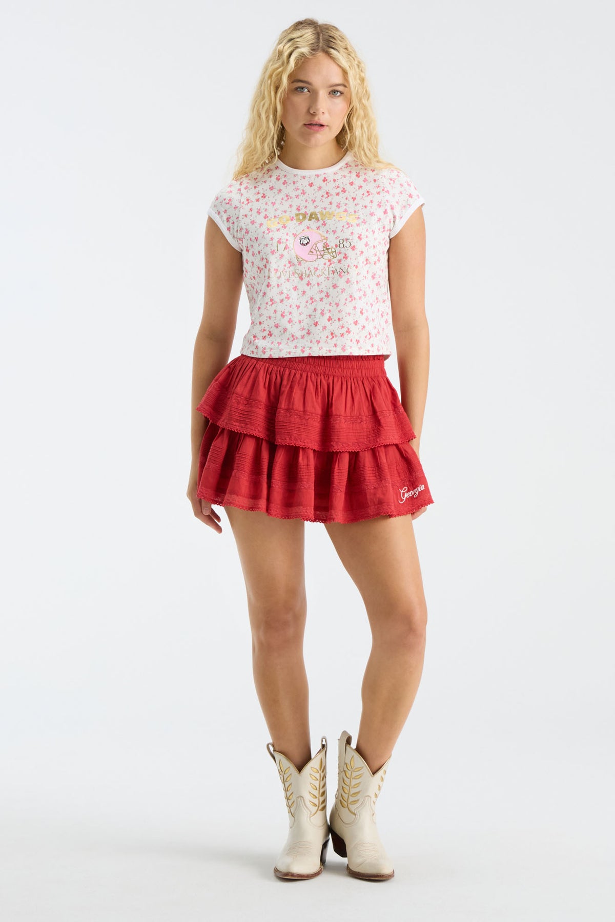 Pink floral ringer tee with crew neck and short sleeves, front graphic