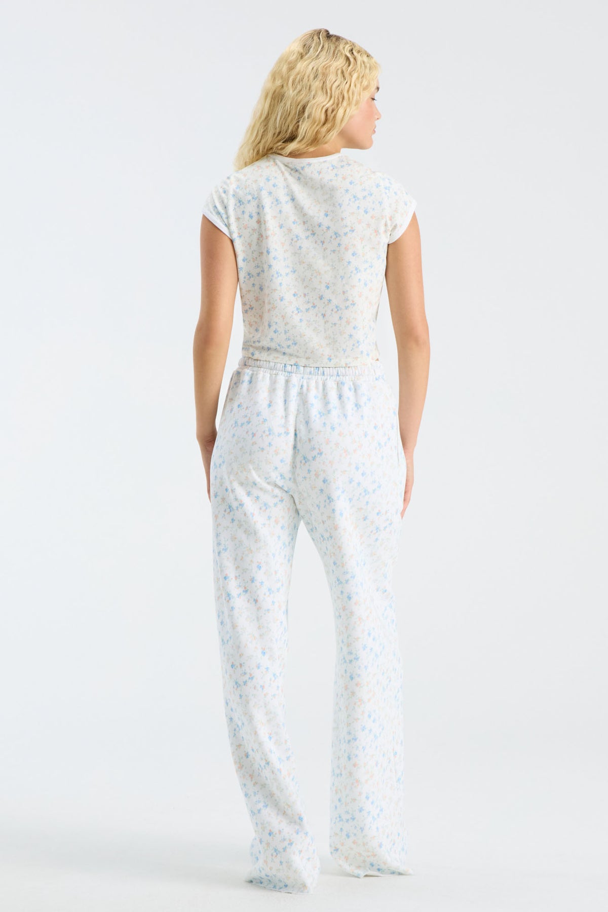 Fanatics x LoveShackFancy light floral ringer tee back view, cap sleeves, no visible graphic