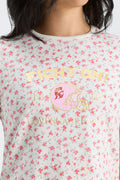 White floral ringer tee with โFIGHTONโ lettering and pink helmet graphic