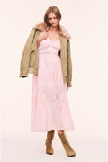Pink midi cotton dress front view with V-neck, thin straps, and embroidered stitching