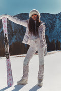 Women’s white half-zip pullover with subtle allover pattern and long sleeves