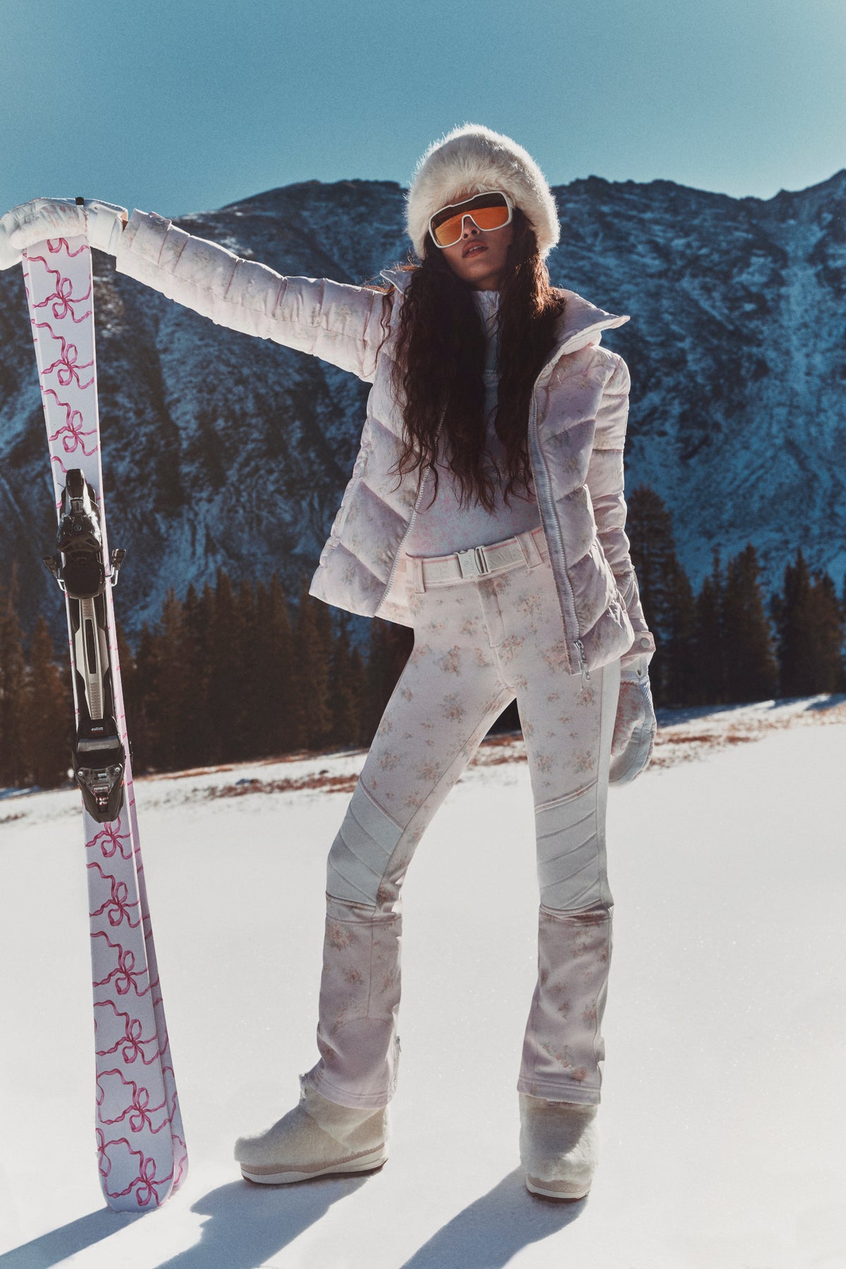 Women’s white half-zip pullover with subtle allover pattern and long sleeves