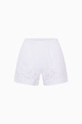 White fleece shorts with allover eyelet embroidery, pull-on elastic waistband