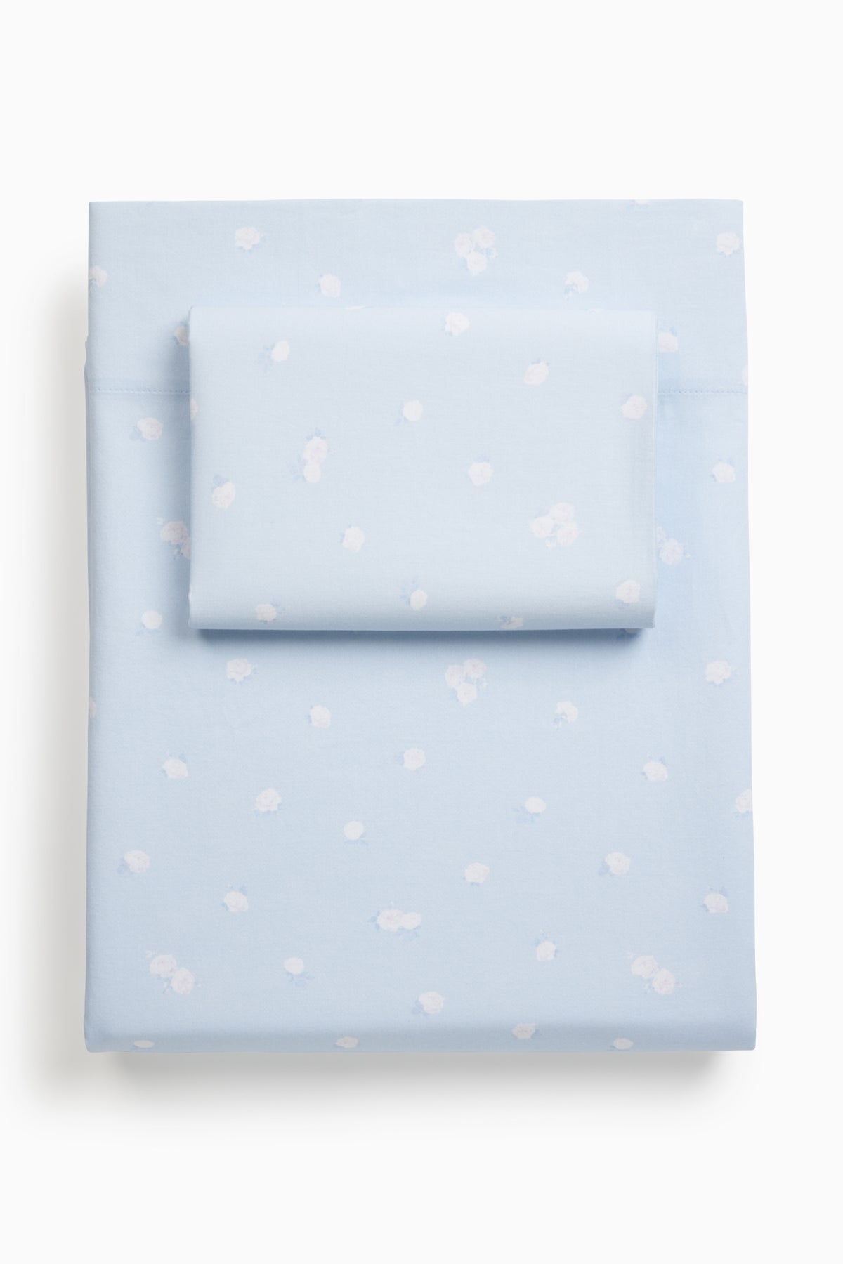 Breezy blue printed sheet set with small white motif pattern, flat sheet and pillowcase