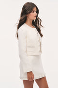 Tween tweed jacket in light ivory, side view with patch pockets and button placket