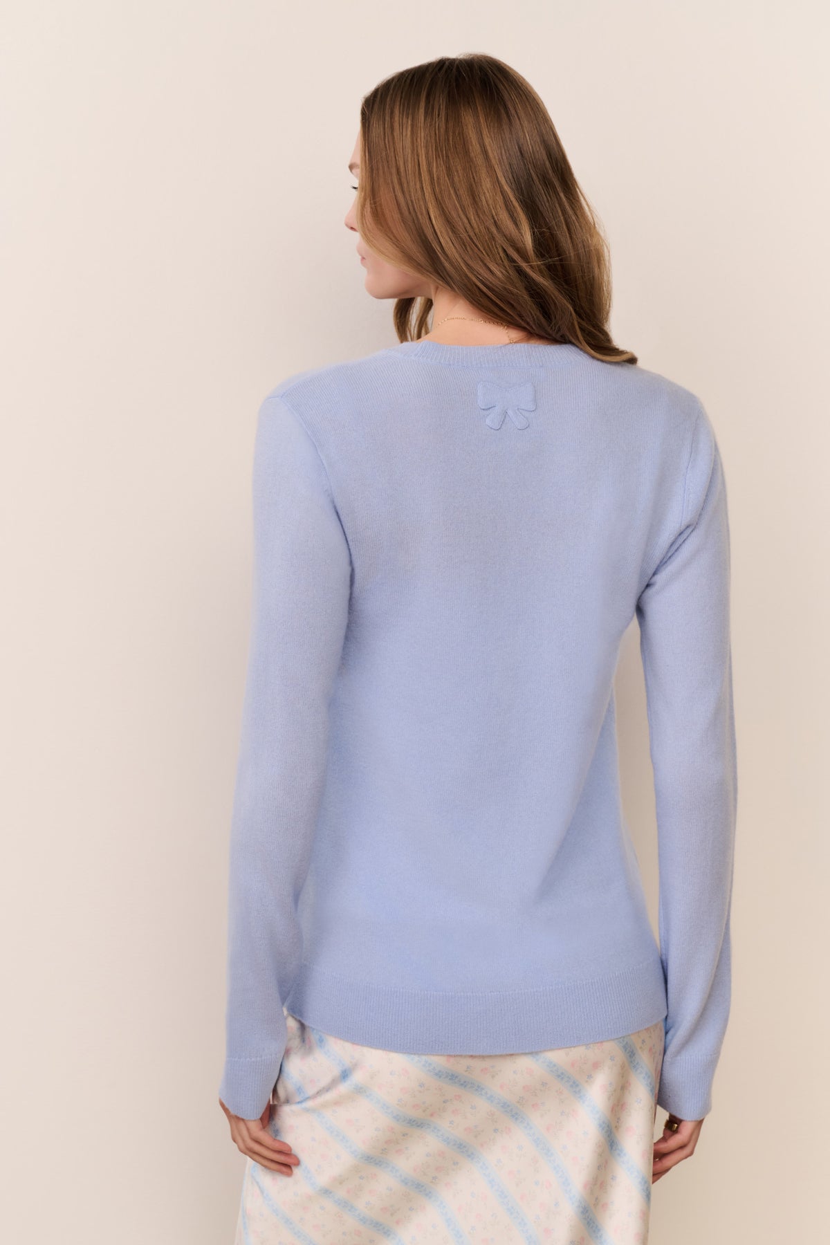 Light blue cashmere cardigan back view with long sleeves