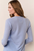 Light blue cashmere cardigan back with long sleeves and small embroidered motif