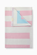 Weathered rose blanket with pink/white stripes, blue star panel, stitched hem