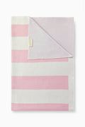 Weathered rose blanket with pink/white stripes and stitched blue star corner