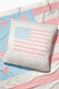 Decorative pillow with faded American flag hearts and pink stripes; LOVE SHACK FANCY