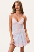 Tiered cami top with V-neck and thin spaghetti straps in pastel pink and blue floral
