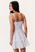 Light blue printed mini dress back with thin lace-trim straps and tiered ruffle hem.