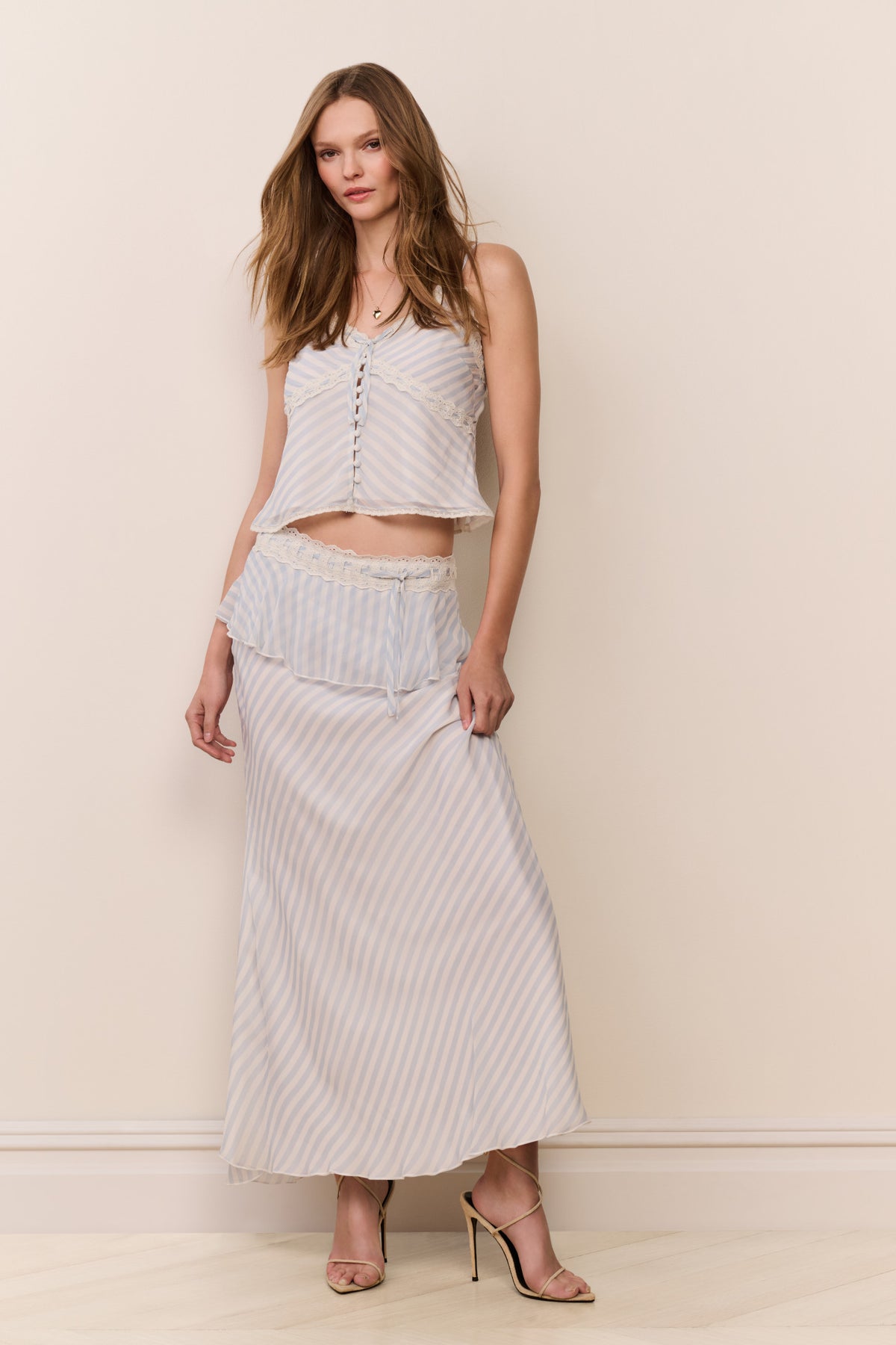 Light blue and white vertical stripe chiffon maxi skirt with ruffled waistband and front tiers
