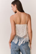 Ivory lace crop top back view with thin straps and long fringe trim