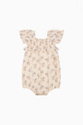 Baby cotton pinafore in light cream with small floral print and flutter sleeves