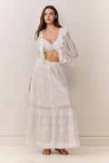 White embroidered maxi skirt with button placket and layered ruffle tiers at hem