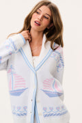 Light knit cardigan with button front, V-neck, blue and pink nautical pattern